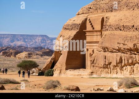 Al Ula, Saudi Arabia - February 05 2023: Tourists visit the famous tombs of the Nabatean civilization, Al-Ula being their second largest city after Pe Stock Photo