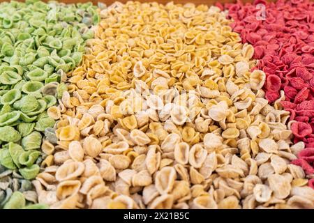 Colorful Orecchiette, typical pasta from Bari, in southern Italy.Tourism, Puglia, holiday destination Stock Photo