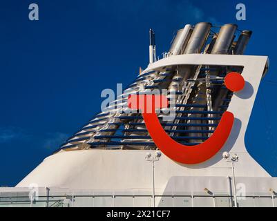 Caribbean - Jan 26 2024: TUI Group corporate branding on the funnel and exhaust superstructure on a cruise ship. TUI is a German leisure, travel and t Stock Photo