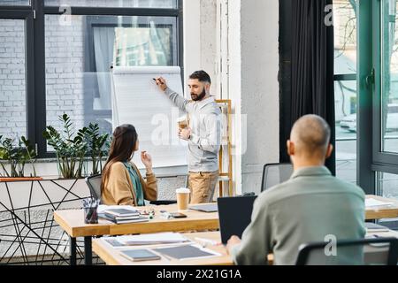 A diverse group of professionals collaborating around a table in an office, brainstorming ideas and working on a project. Stock Photo