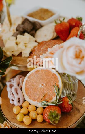 Grapefruit Closeup with Charcuterie board in background Stock Photo