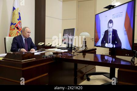 Novo-Ogaryovo, Russia. 18th Apr, 2024. Russian President Vladimir Putin hosts a remote meeting via video conference with the Murmansk Region Governor Andrei Chibis from the Novo-Ogaryovo state residence, April 18, 2024 in Moscow Oblast, Russia. Credit: Gavriil Grigorov/Kremlin Pool/Alamy Live News Stock Photo