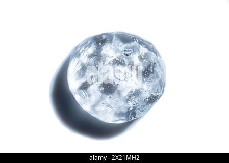 Glycerin or silicone gel texture. Blue serum or sanitizer drop isolated on white background. Thick collagen gel moisturizer with bubbles Stock Photo