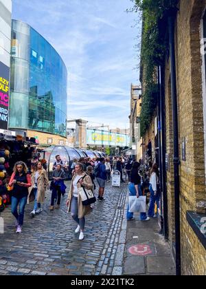 London, UK. 13th Apr, 2024. People walk on the street in Camden, London. (Credit Image: © Mairo Cinquetti/SOPA Images via ZUMA Press Wire) EDITORIAL USAGE ONLY! Not for Commercial USAGE! Stock Photo