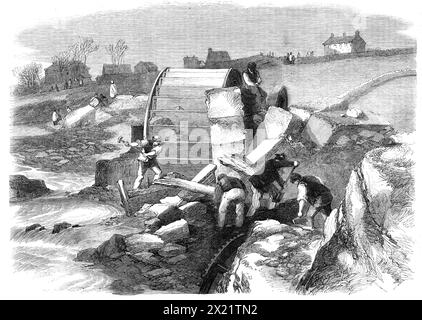 Illustrations of the Flood at Sheffield: remains of Broadhead Wheel Mill, on the Loxley, near Matlock: workmen searching for tools, 1864. Aftermath of a burst reservoir, caused by inadequate building materials. Over a hundred people were killed. From &quot;Illustrated London News&quot;, 1864. Stock Photo