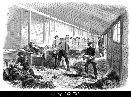 The War in Denmark: temporary field hospital behind the second Prussian parallel at D&#xfc;ppel: scene in the amputating hut - from a sketch by our special artist, 1864. '...rather a painful scene...a view of the interior of the amputating-hut belonging to the temporary field hospital just behind the second parallel of the Prussian siege works...[a] typical illustration of this cruel and unprovoked war'. From &quot;Illustrated London News&quot;, 1864. Stock Photo