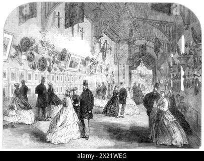 Exhibition at Alton Towers, Staffordshire, in aid of the Wedgwood Institute of Burslem - the Picture-Gallery and Armoury, 1865. '...it is intended that the building itself shall illustrate the constructive as well as the decorative uses of ceramic art...Earl Granville had done much to further this scheme, having allowed the exhibition committee to borrow some of the art- treasures from the museum at South Kensington...in respect of Wedgwood ware, a larger show was rarely if ever seen. There are also some excellent specimens of Staffordshire ware, from the best local manufacturers...The Armoury Stock Photo