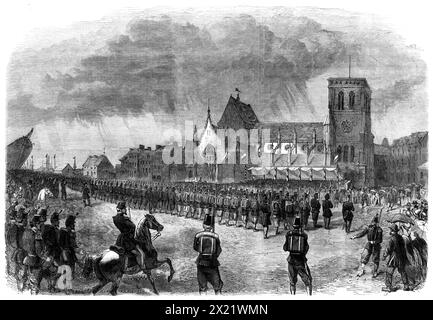 Review of French troops on the Place Napoleon at Cherbourg, [northern France], 1865. 'The subject of our Illustration...from a sketch by our special artist... is a military, not a naval, display - being the review of the French troops forming the garrison of Cherbourg, who were paraded and put through the usual manoeuvres on the Place d'Armes. The officers of the English and French squadrons paid frequent visits to each other's ships in the course of the day, and exchanged various official compliments'. From &quot;Illustrated London News&quot;, 1865. Stock Photo