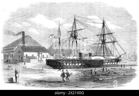 H.M.S. Leopard in dock at Shanghai, 1865. 'An officer of H.M.S. Leopard has sent us a sketch of the position of that ship in Muirhead's Dock, Shanghai, after being ashore on the south coast of Japan, on the 16th of April last. It may be interesting to some of our readers to know that a dock of such dimensions is now open at Shanghai, and capable of taking in ships of the largest class and of the Leopard's beam (68 ft.), without removing the paddle-wheels, a convenience the want of which, has been much felt in the navigation of the Eastern seas. The caisson entrance here is 75 ft. wide, and the Stock Photo