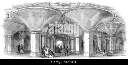 Subway of the new High-Level Station at the Crystal Palace, [Sydenham], 1865. 'The South London and Crystal Palace Railway...has now been open several weeks...the superior convenience of the new Crystal Palace station is already felt by many visitors...[who are able to] avoid the tedious walk up half a mile of corridors and staircases imposed on those arriving by the Brighton Company's line...The platform of the station being on a level with the lower floor (in the machinery department) of the Crystal Palace, railway passengers will have easy access by a handsome and well-lighted subway, 40 ft Stock Photo