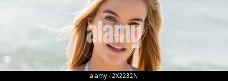 Close up of a young, beautiful blonde woman with an ethereal glow in Miami Beach. Stock Photo