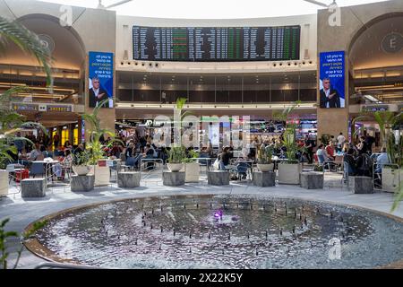 Ben Gurion Airport, Israel - March 20, 2024, People at Ben Gurion Airport are sitting at tables waiting for the plane. Stock Photo