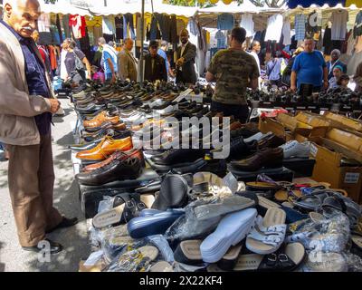 MONTREUIL (Paris), France, Medium Crowd People, Street Scene, men Shopping for Used Vintage Clothing in Flea Market, Suburbs, Used Shoes Stock Photo