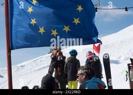 EU citizens with blue European Union flag with yellow stars EU citizens with blue European Union flag Stock Photo