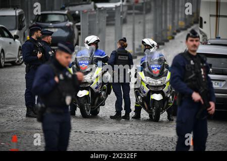 A security perimeter was set up in front of the Iranian consulate, in Paris' 16th arrondissement on April 19, 2024, after a witness saw a man entering with a grenade or an explosive vest at around 11 AM, according to the prefecture of the police. The man was arrested by the BRI (Research and Intervention Brigade) after exiting the Iranian consulate by his own free will. Contrary to his statements, he was not carrying explosives as he reportedly said he wanted to avenge his brother. The 61-year-old Frenchman of Iranian origin had already been arrested after starting a fire near the Iranian cons Stock Photo