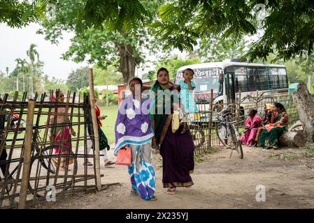 April 19, 2024: BOKAKHAT, INDIA - APRIL 19: Voters arrives at a polling station to cast their votes during the first phase of the India's general elections on April 19, 2024 in Bokakhat, Assam, India. Nearly a billion Indians vote to elect a new government in six-week-long parliamentary polls starting today. (Credit Image: © David Talukdar/ZUMA Press Wire) EDITORIAL USAGE ONLY! Not for Commercial USAGE! Stock Photo