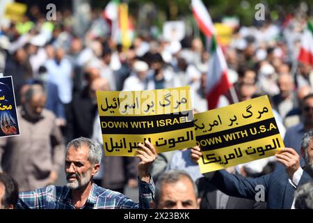 Tehran, Iran. 19th Apr, 2024. Demonstrators march during a rally in Tehran, Iran, April 19, 2024. Iranians on Friday staged nationwide rallies to express support for the country's retaliatory strikes against Israeli targets last week, the official news agency IRNA reported. Credit: Shadati/Xinhua/Alamy Live News Stock Photo