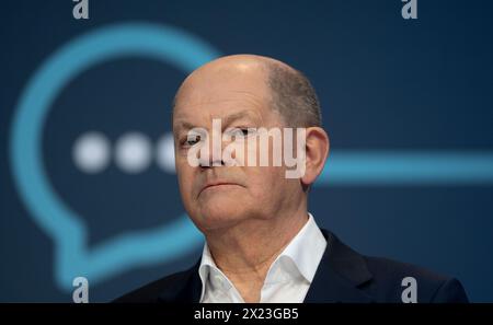 Chemnitz, Germany. 19th Apr, 2024. Federal Chancellor Olaf Scholz (SPD) takes to the podium during the readers' debate of the daily newspaper 'Freie Presse' in Chemnitz. Topics of discussion include the wars and crises in the world, the current social situation in Germany and immigration and its consequences. Credit: Hendrik Schmidt/dpa/Alamy Live News Stock Photo