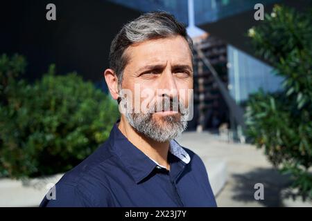 Portrait of a mature businessman looking at the camera with a serious face. Stock Photo