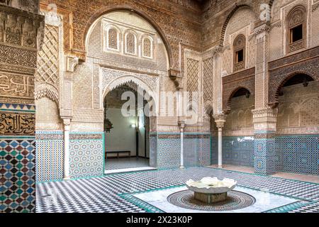 Fez, Morocco - March 18, 2024: Al-Attarine Madrasa, Fez medina, Morocco. It was built by the Marinid sultan Uthman II Abu Said in 1323-5. Stock Photo