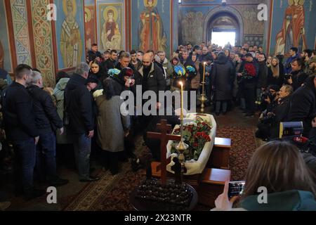 KYIV, UKRAINE - APRIL 19, 2024 - People pay their last respects to Sergeant of the 59th Brigade Pavlo Petrychenko who perished while defending Ukraine from Russian troops during the memorial service at St Michael’s Golden-Domed Cathedral, Kyiv, capital of Ukraine. Ukrainian serviceman and activist Pavlo Petrychenko was a sergeant in the 59th Separate Motorized Infantry Brigade and the author of the petition that urged to limit online casinos for military personnel during martial law, which garnered the 25,000 votes needed to be considered by the President within hours of its publication. News Stock Photo