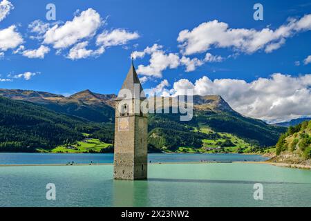Church tower of Alt-Graun in Lake Reschen with Vinschgau mountains, Lake Reschen, Vinschgau, South Tyrol, Italy Stock Photo