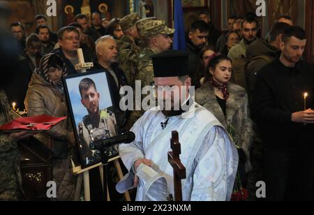 KYIV, UKRAINE - APRIL 19, 2024 - The portrait of Sergeant of the 59th Brigade Pavlo Petrychenko who perished while defending Ukraine from Russian troops is pictured during the memorial service at St Michael’s Golden-Domed Cathedral, Kyiv, capital of Ukraine. Ukrainian serviceman and activist Pavlo Petrychenko was a sergeant in the 59th Separate Motorized Infantry Brigade and the author of the petition that urged to limit online casinos for military personnel during martial law, which garnered the 25,000 votes needed to be considered by the President within hours of its publication. News of Pet Stock Photo