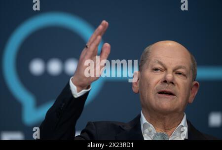 Chemnitz, Germany. 19th Apr, 2024. Federal Chancellor Olaf Scholz (SPD) takes to the podium during the readers' debate of the daily newspaper 'Freie Presse' in Chemnitz. Topics of discussion include the wars and crises in the world, the current social situation in Germany and immigration and its consequences. Credit: Hendrik Schmidt/dpa/Alamy Live News Stock Photo
