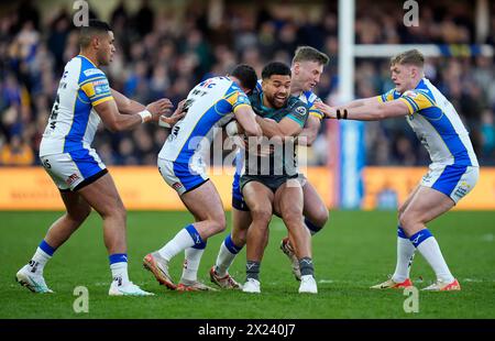 Huddersfield Giants' Esan Marsters is tackled during the Betfred Super League match at AMT Headingley Rugby Stadium, Leeds. Picture date: Friday April 19, 2024. Stock Photo