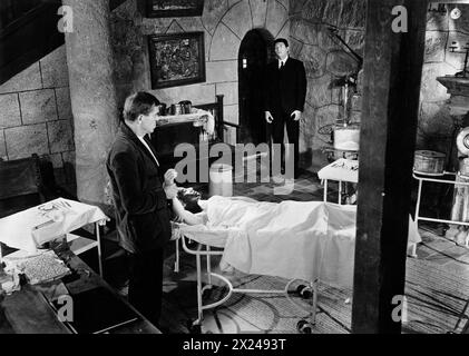 Howard Vernon (left), on-set of the Spanish-French film, 'The Awful Dr. Orlof', original Spanish title', 'Gritos en la noche,' Delta Films, 1962 Stock Photo