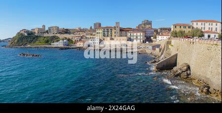 Panoramic view of Piombino marina, Tarsinata (protected pier) and the church of Sant'Antimo, Piombino, Tuscany, Italy Stock Photo