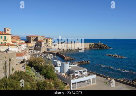 The marina of Piombino, Tarsinata (protected pier) and Piazza Bovio Piombino, Tuscany, Italy Stock Photo