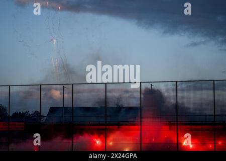 Gent, Belgium. 19th Apr, 2024. Supporters with fireworks and smoke bombs pictured during a soccer game between KAA Gent Ladies and RSCA Women, Friday 19 April 2024 at the Chillax Arena in Gent, on day 5 of the play-off group A of the Super League women's competition. BELGA PHOTO JASPER JACOBS Credit: Belga News Agency/Alamy Live News Stock Photo