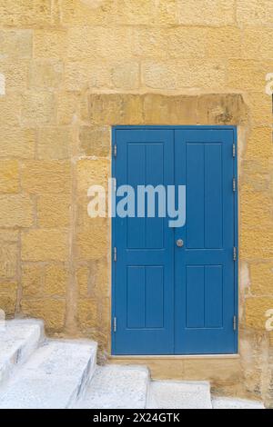 Valletta, Malta, April 03, 2024.  external view of the typical entrance doors of houses in the city center Stock Photo
