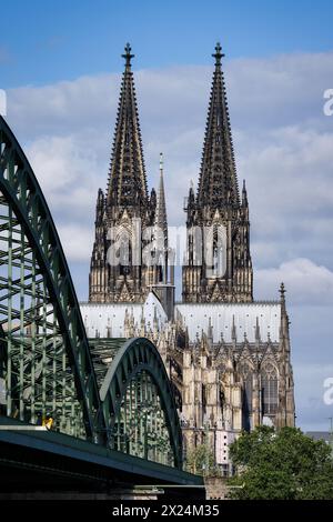 view of the east side of cologne cathedral from the hohenzollern bridge to the crossing tower and the impressive twin towers Stock Photo