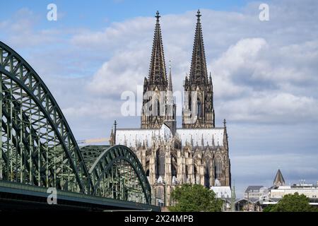 view of the east side of cologne cathedral from the hohenzollern bridge to the crossing tower and the impressive twin towers Stock Photo