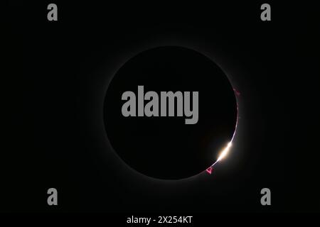 Total solar eclipse with bright Baily's beads, moon exit Stock Photo