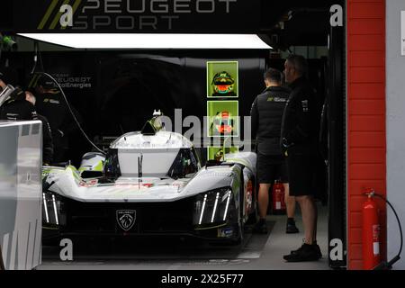 Imola, Italy. 19th Apr, 2024. #94 Paul Di Resta, Loic Duval, Stoffel Vandoorne Of The Team Peugeot Totalenergies, Peugeot 9X8, Hypercar in Box During Fia World Endurance Championship WEC 6 Hours Of Imola Italy 2024 19 April, Imola, Italy Credit: Independent Photo Agency/Alamy Live News Stock Photo