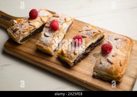Chocolate San Juan Coca. Traditional San Juan cake to celebrate the arrival of summer in Spain made with puff pastry and cocoa cream. Stock Photo