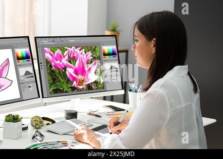 Office Designer at Work: Graphic Artist on Computer Stock Photo