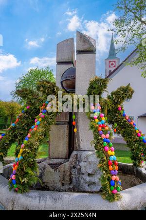 Beautifully decorated Easter fountain in Wallersdorf, Lower Bavaria, Bavaria, Germany Stock Photo
