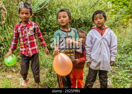 SAMARKISAY, LAOS - NOVEMBER 22, 2019: Children of Samarkisay village in Phongsali province, Laos Stock Photo