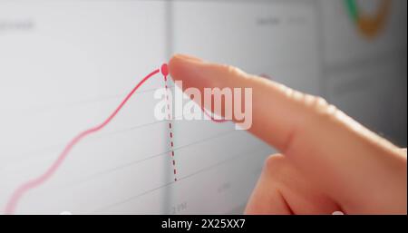 Close-up Of Businessman Analyzing Graph On Touchscreen Monitor Stock Photo