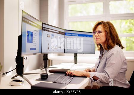 Woman Using Online Ecommerce Shop On Desktop Stock Photo