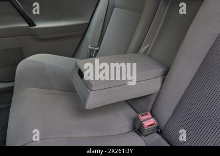 Car passenger back rear seats armrest in gray color Stock Photo