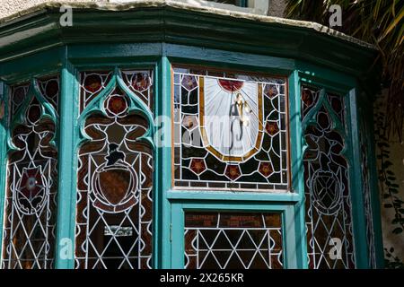 Old ornate windows at the old Parsonage, Fletcher Moss botanical garden, Didsbury, Greater Manchester, England. Stock Photo