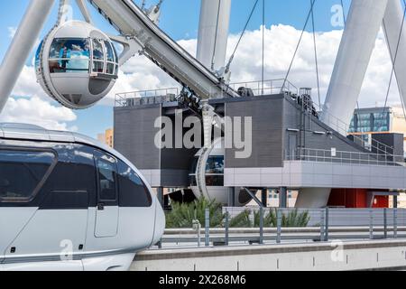 Las Vegas, Nevada.  Monorail, with High Roller in background.  The High Roller is the world's tallest observation wheel, as of 2015. Stock Photo