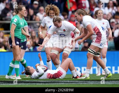 England's Natasha Hunt is congratulated by her team mates after scoring ...