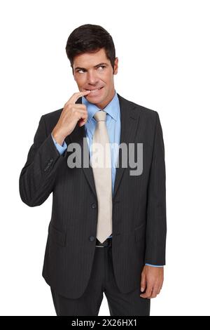 Anxiety, businessman and nail biting, in portrait with stress, thinking and problem solving for debt in studio. Confused, man or worker and idea for Stock Photo