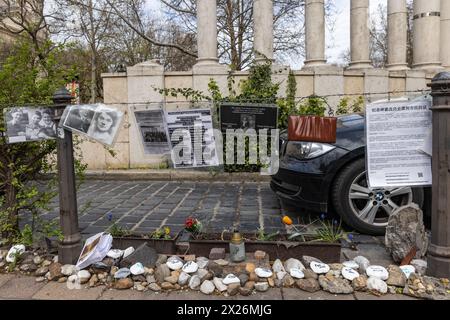 Budapest, Hungary. 29th March, 2024. Tributes to Holocaust victims are pictured in Liberty Square. The tributes were prepared by Jewish groups who regard the large Memorial for Victims of the German Occupation (2014) behind as controversial because it absolves Hungary and Hungarians of complicity in the Holocaust. Credit: Mark Kerrison/Alamy Live News Stock Photo